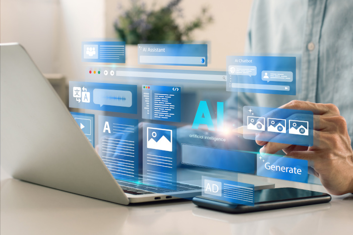 persona delante de una computadora revisa gráficos con la palabra inteligencia artificial